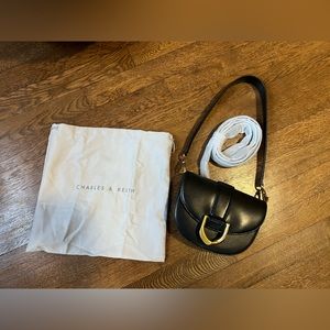 Charles & Keith small saddle bag in black